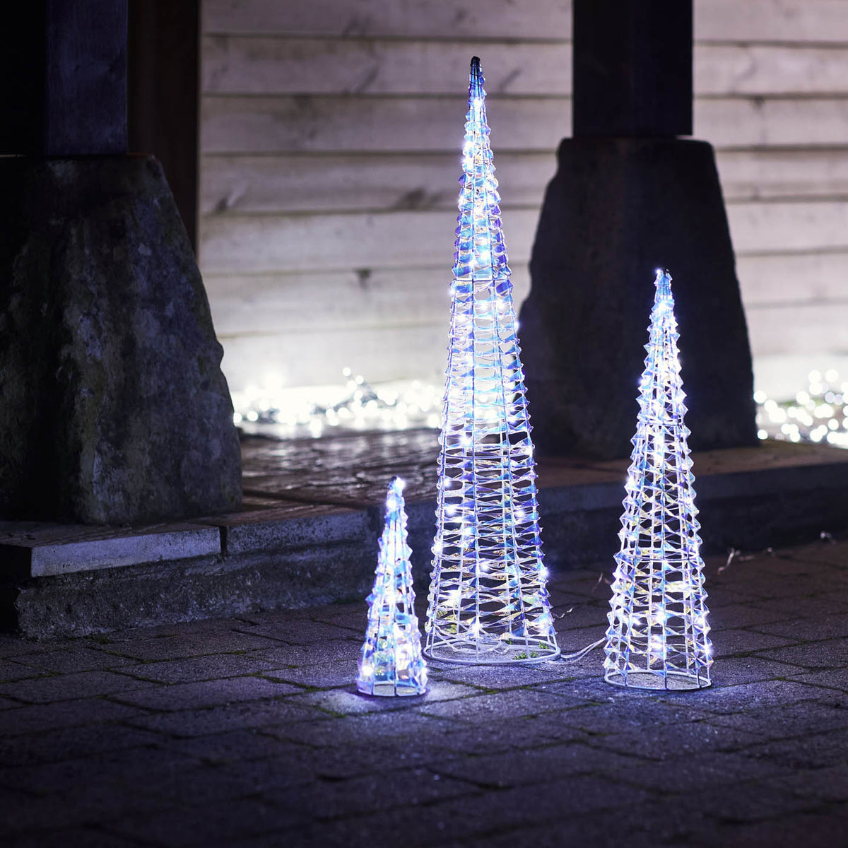 990 Christmas Cone Trees Silhouette Ice White LED Freestanding 3 Pack (H) 750mm - Image 1